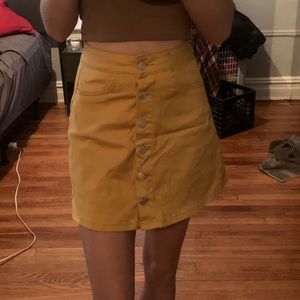 mustard yellow skirt with buttons!
